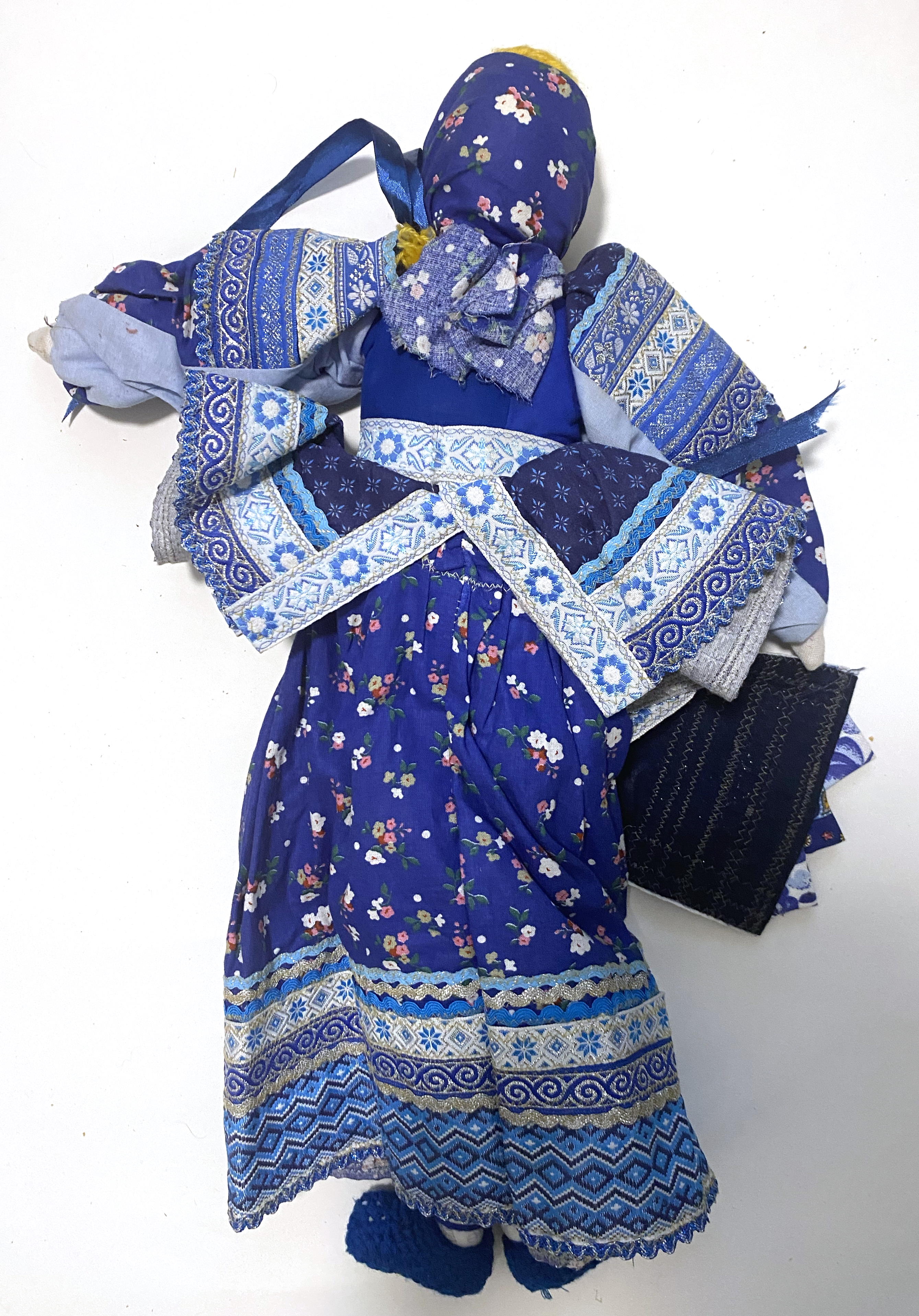 Cloth doll with wooden face, blue gzel