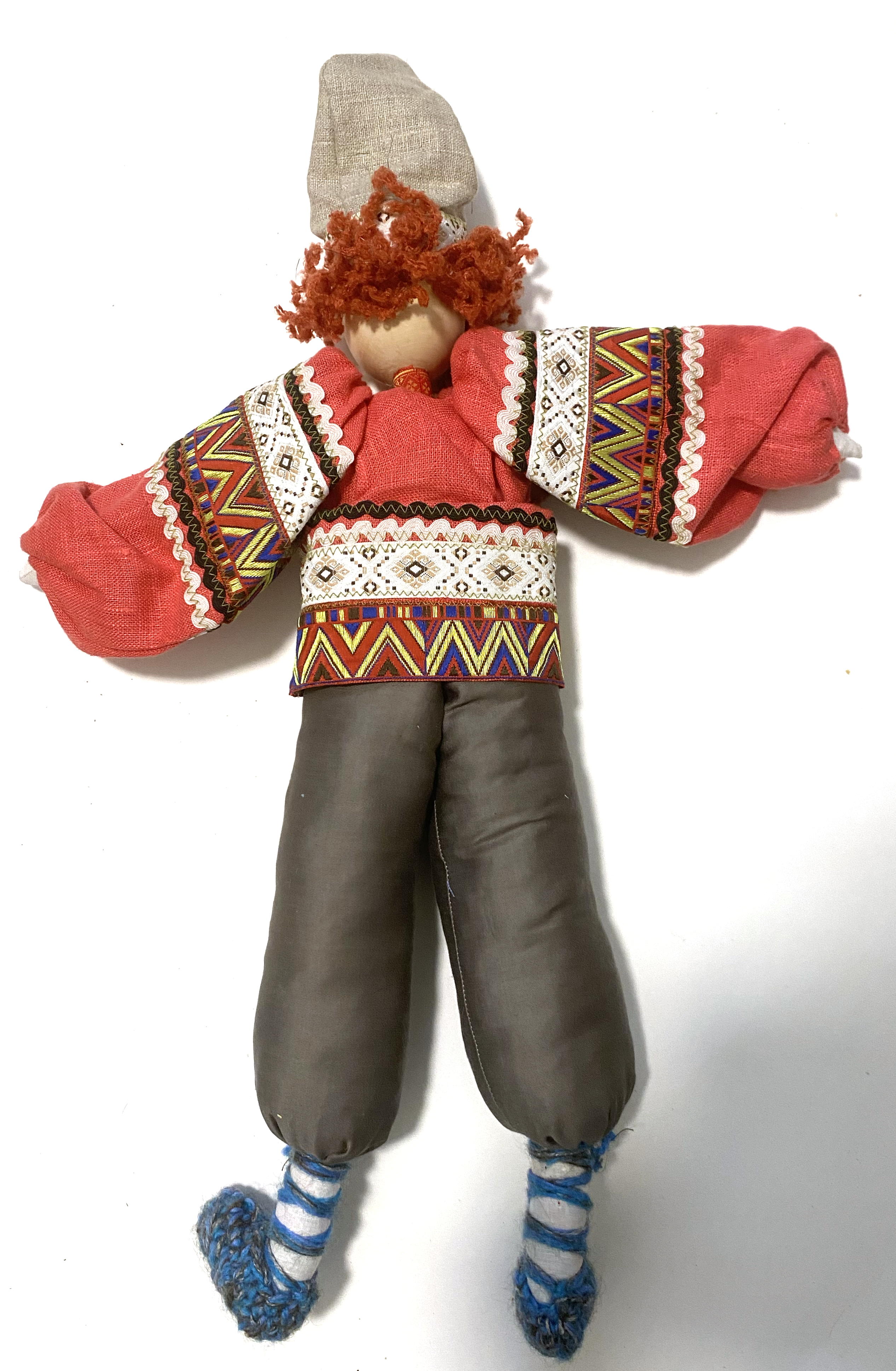 Cloth doll with wooden face, red headed boy