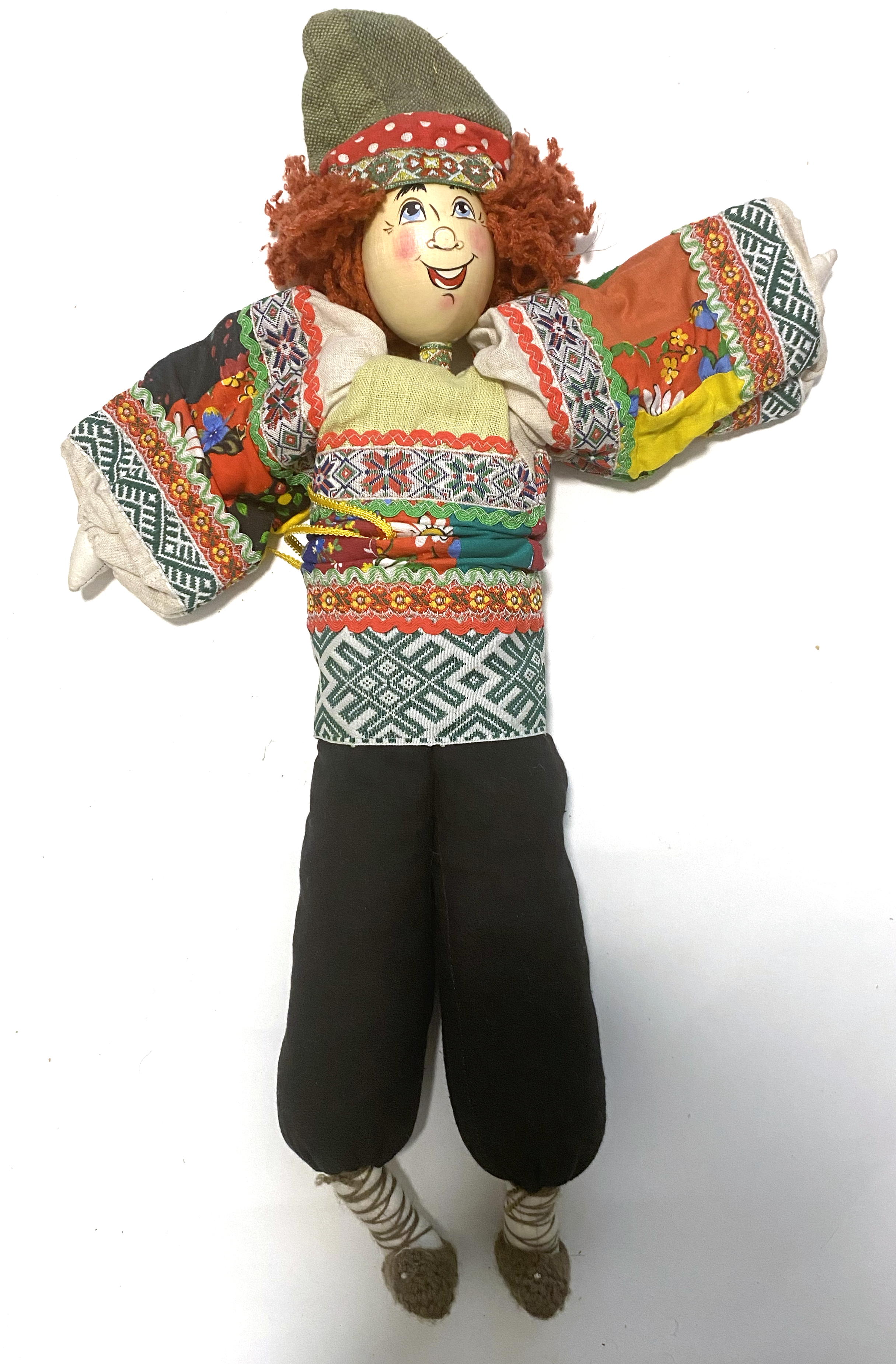 Cloth doll with wooden face, peasant boy